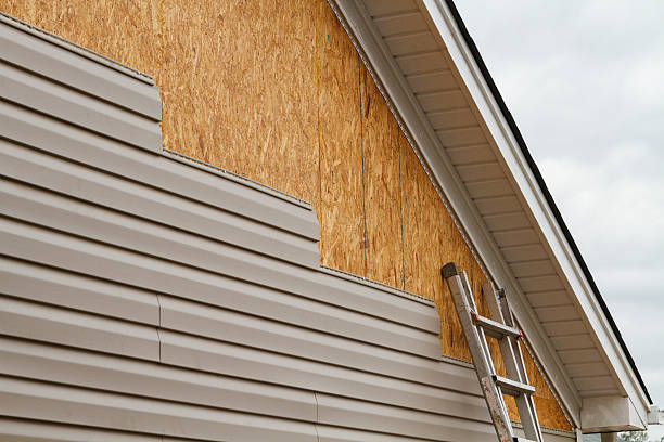 Professional Emergency Siding Repair technician working in Zebulon, GA